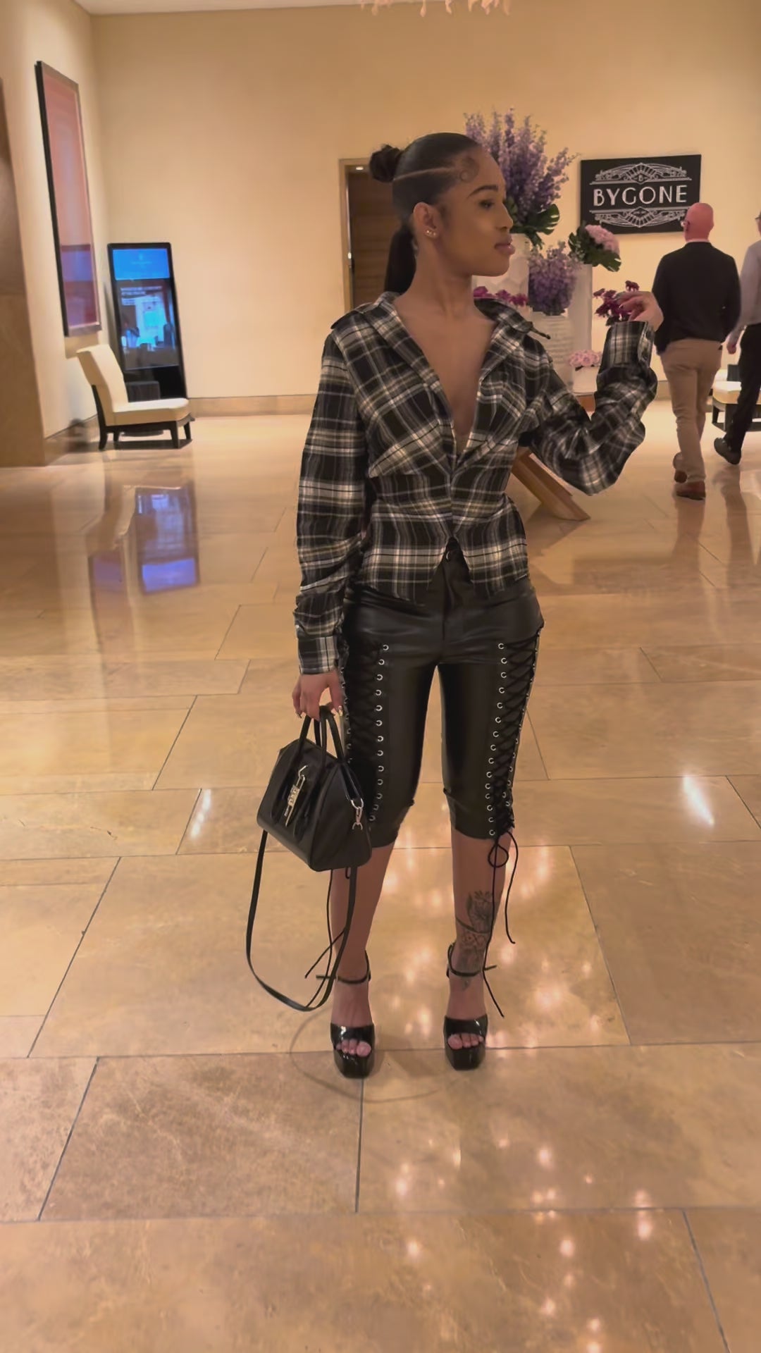 Black pleated top with tie up capris